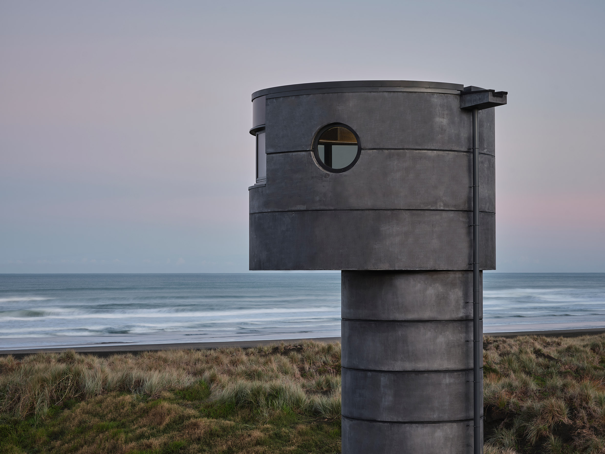 Lifeguard tower made from black concrete 