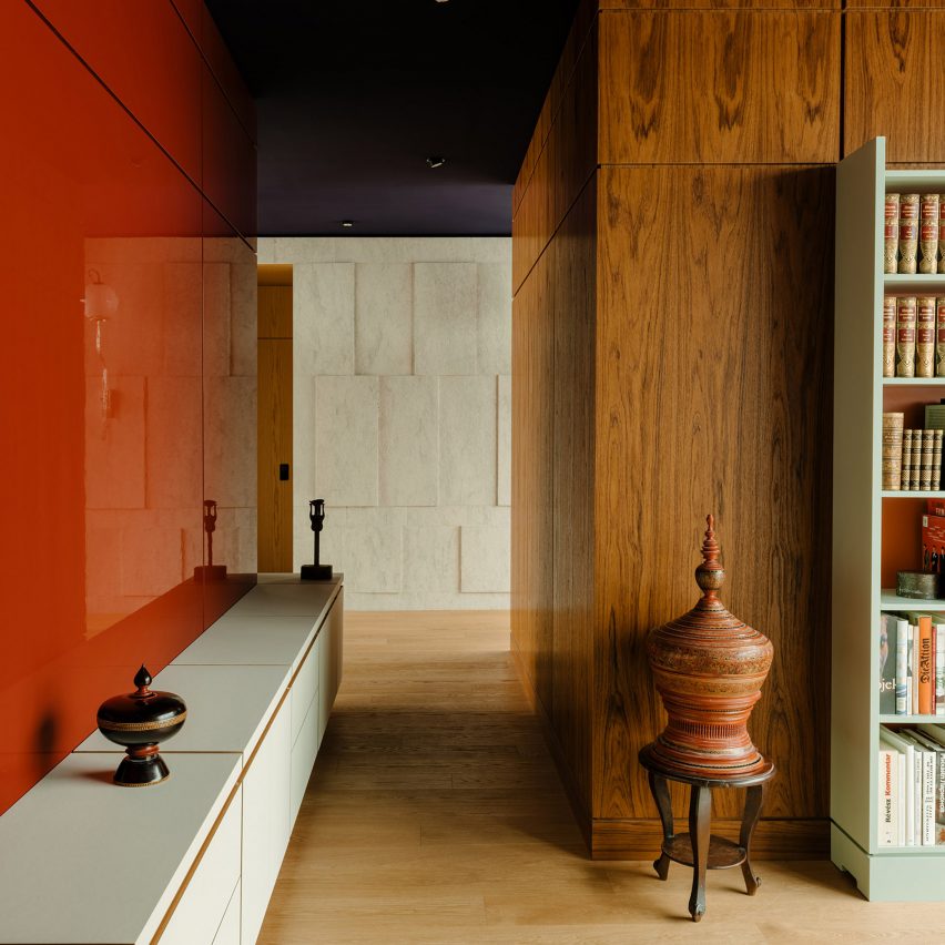The Village apartment, Germany, by Gisbert Pöppler with glossy red lacquered wall
