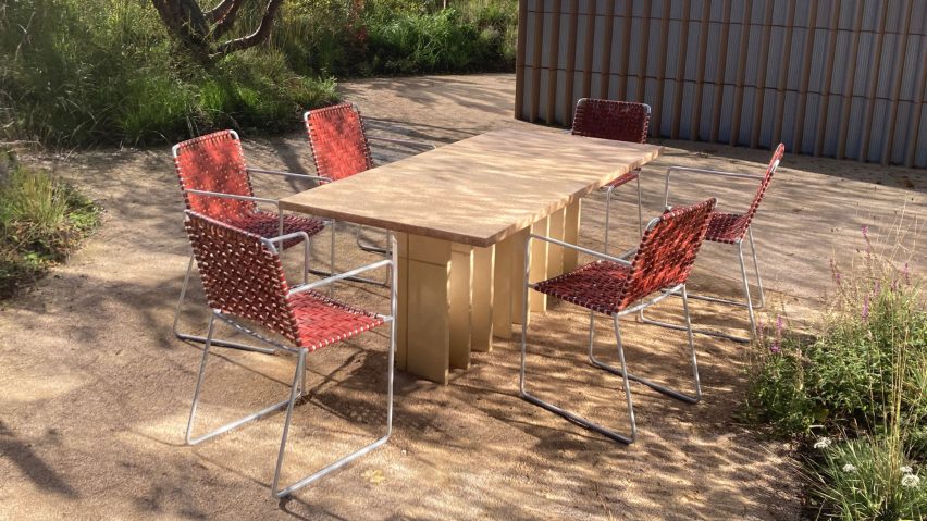 Steel-frame chairs around terrazzo-style table designed by Local Works Studio for Maggie's Southampton