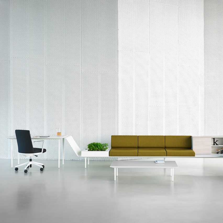 Longo seating with green seat cushions in a large white office space