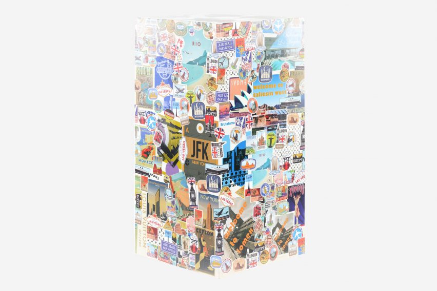 Box coated in travel stickers designed for Louis Vuitton trunk exhibition by Hannes Peer
