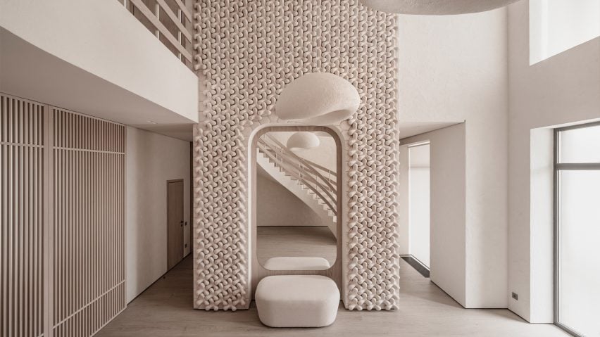 Foyer of Mureli House in Kozyn, Ukraine, by Makhno Studio with wall of 3D ceramic tiles
