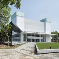 MAYU Architects updates library in Taiwan with glass-walled foyer and white cladding