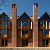 Gables and chimneys inform Magdalene College library by Niall McLaughlin Architects