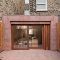 Red stone covers extension to London terrace by O'Sullivan Skoufoglou Architects