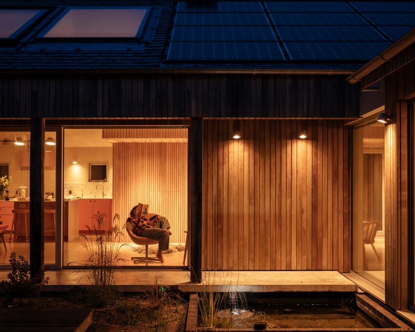 Night view of Clay Retreat in Hampshire by Pad Studio
