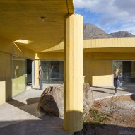 Yellow concrete column of Raem House by Pezo von Ellrichshausen