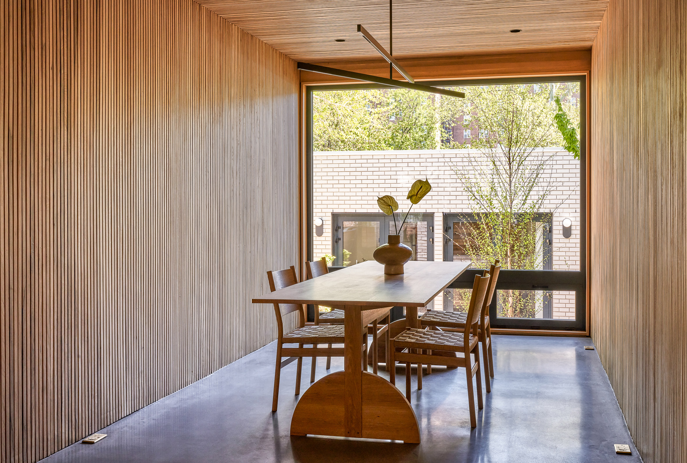 Timber batten-lined walls and ceilings in townhouse by Gradient Architecture