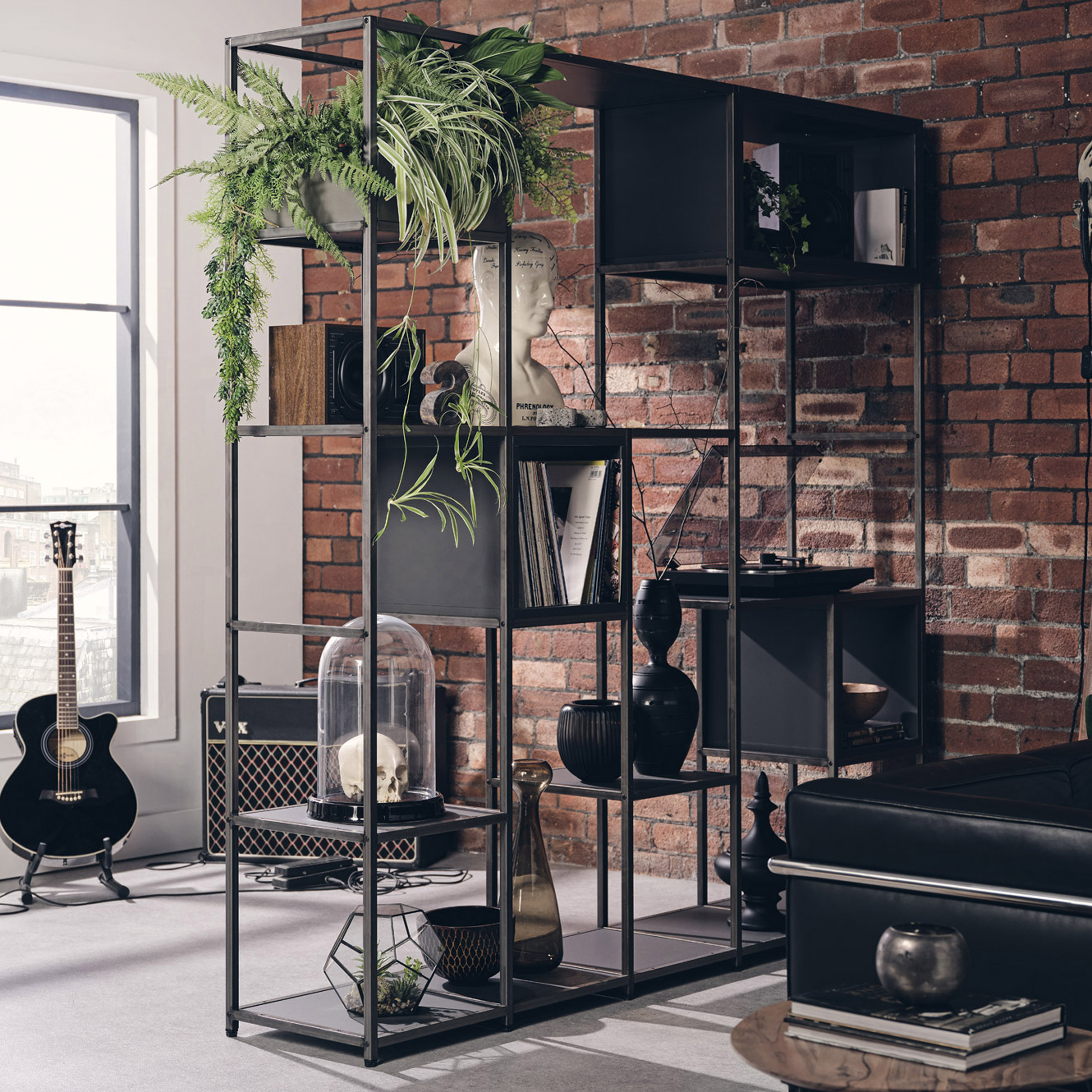 Black Shelved Modular Furniture used as a wall separator in a living room