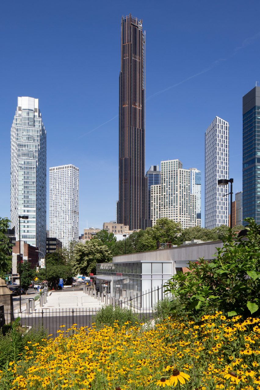 The tall Brooklyn Tower next to shorter skyscrapers