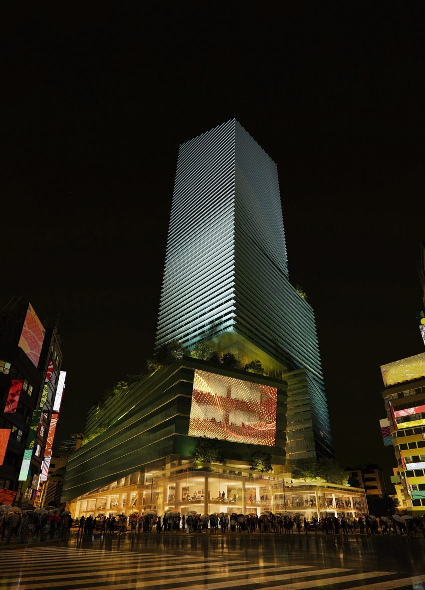 Exterior of Snøhetta's Shibuya Upper West Project tower in Tokyo lit up at night