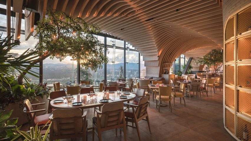 Interior image of the restaurant and its views across Mexico City