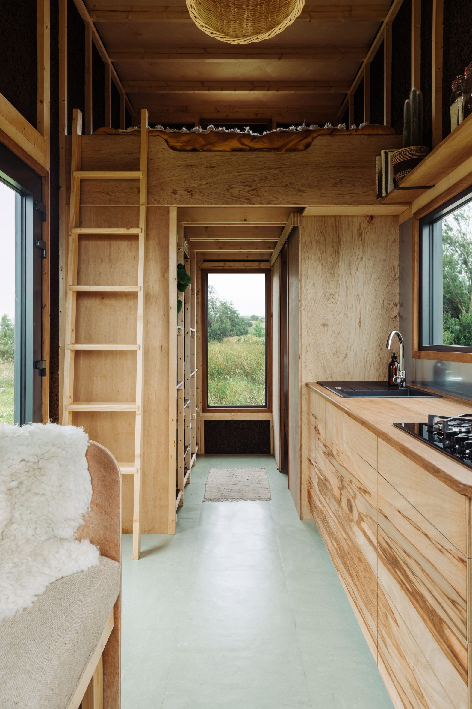 Kitchen and ladder in Tigín Tiny Home by Common Knowledge