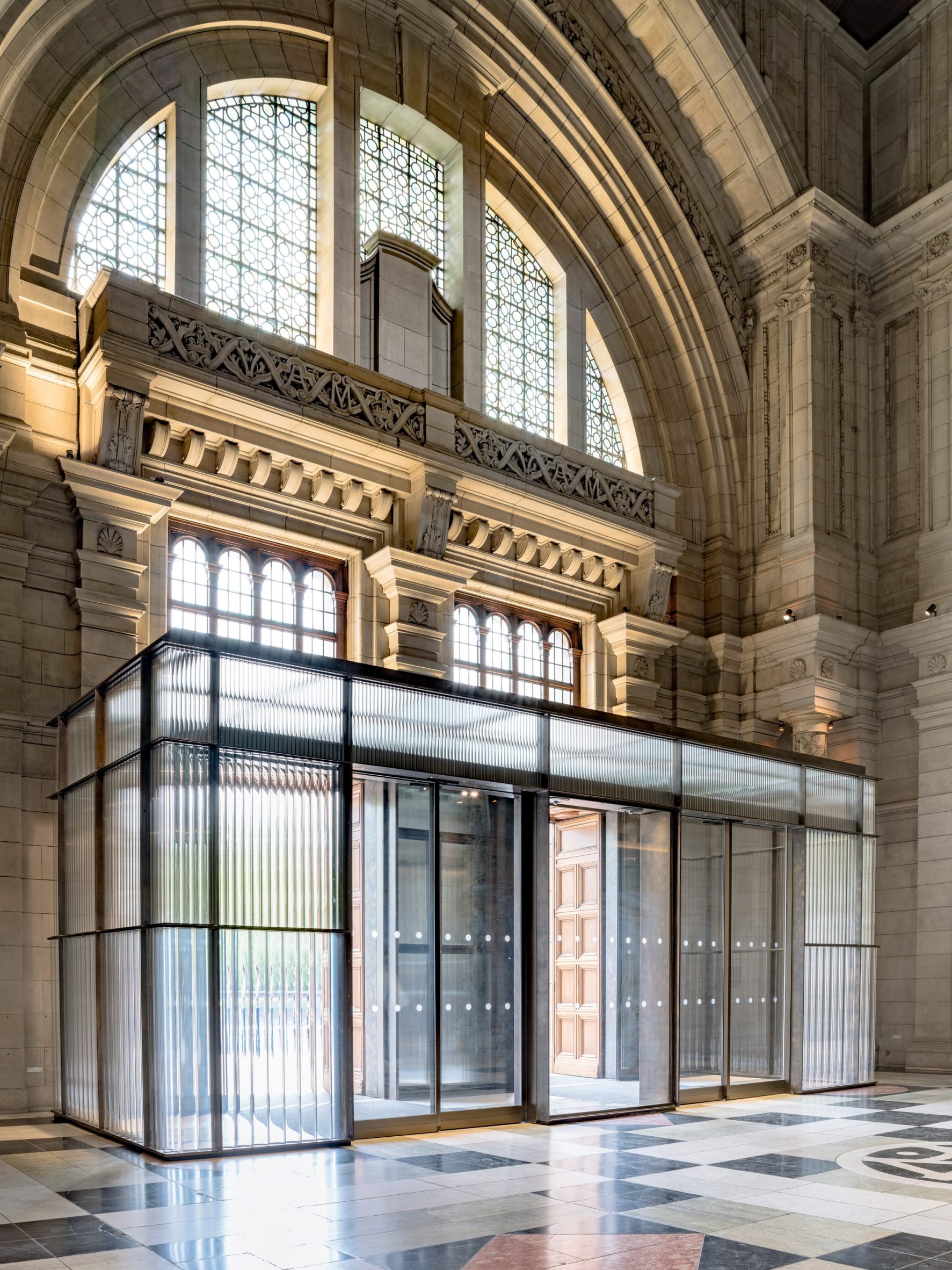 Contemporary glass entrance in historic museum