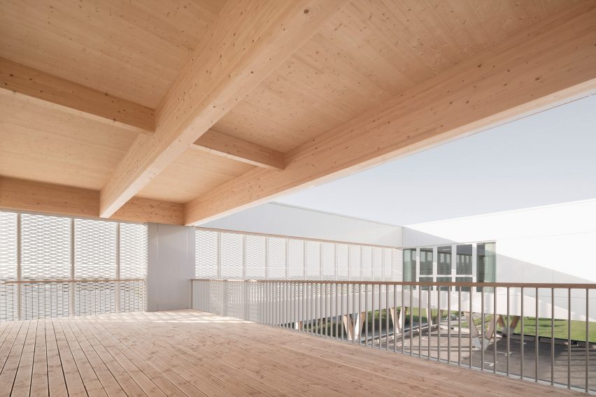 Timber terrace in fire station by Wulf Architekten