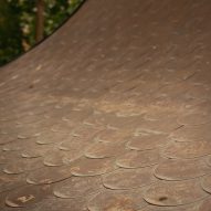 Curved roof with copper tiles