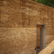Rammed-earth exterior of Invisible Studio's yoga studio at The Newt in Somerset