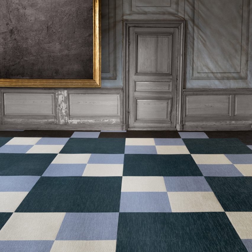 A close up image of Bolon's flooring, which includes blue, green and cream squares 
