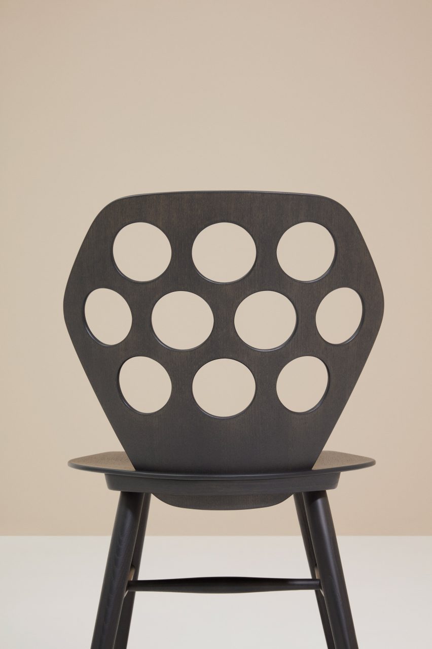 Photograph showing detail of perforated backrest version of chair