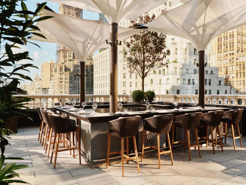 Terrace at Aman New York covered with fabric umbrellas
