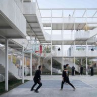 Approach Design turns Beijing police station into office building with multi-storey park
