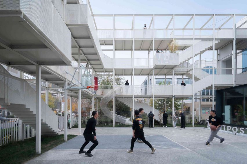 Image of people exercising in a courtyard of TMT Folding Park