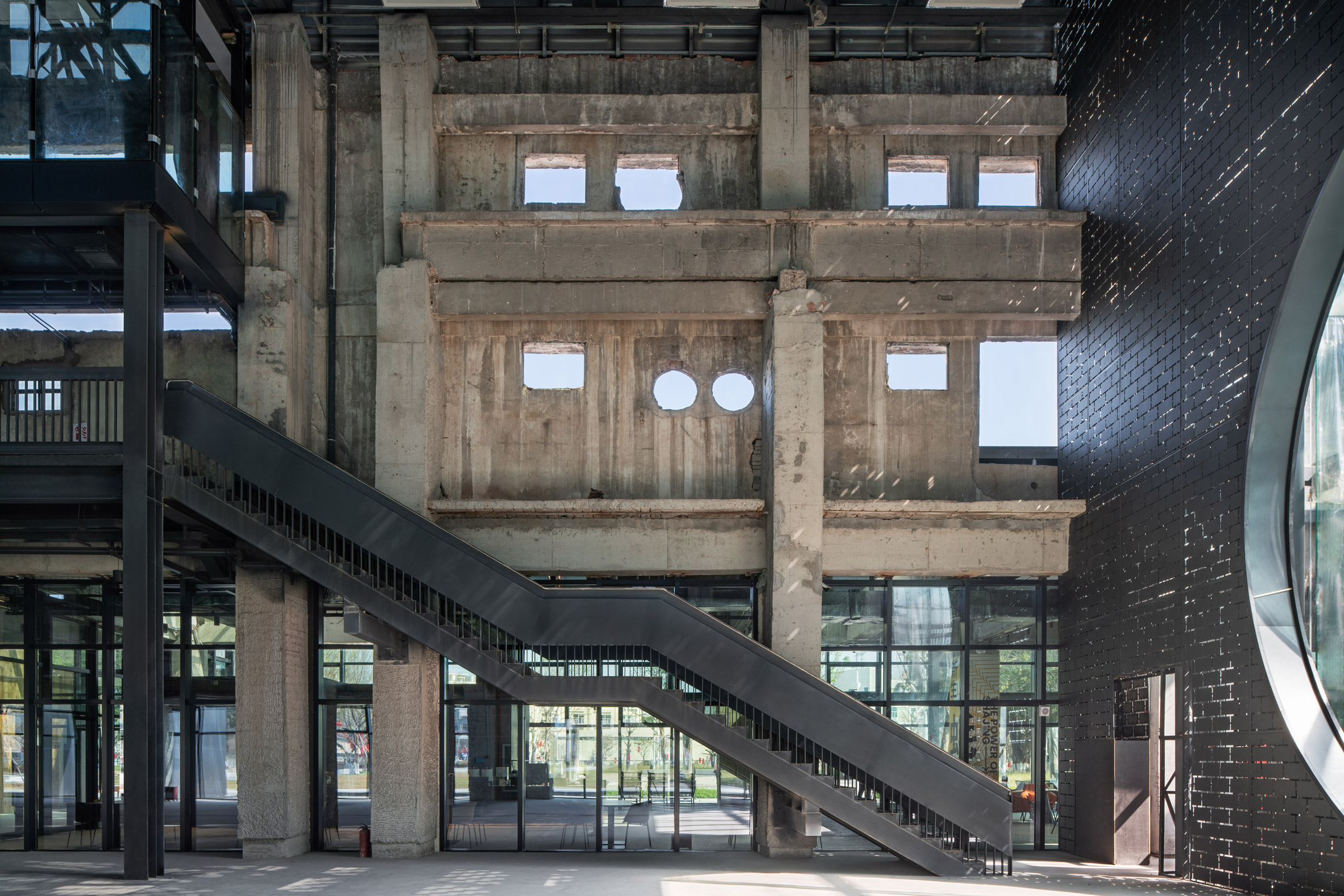 Interior image of community hub in old concrete power plant