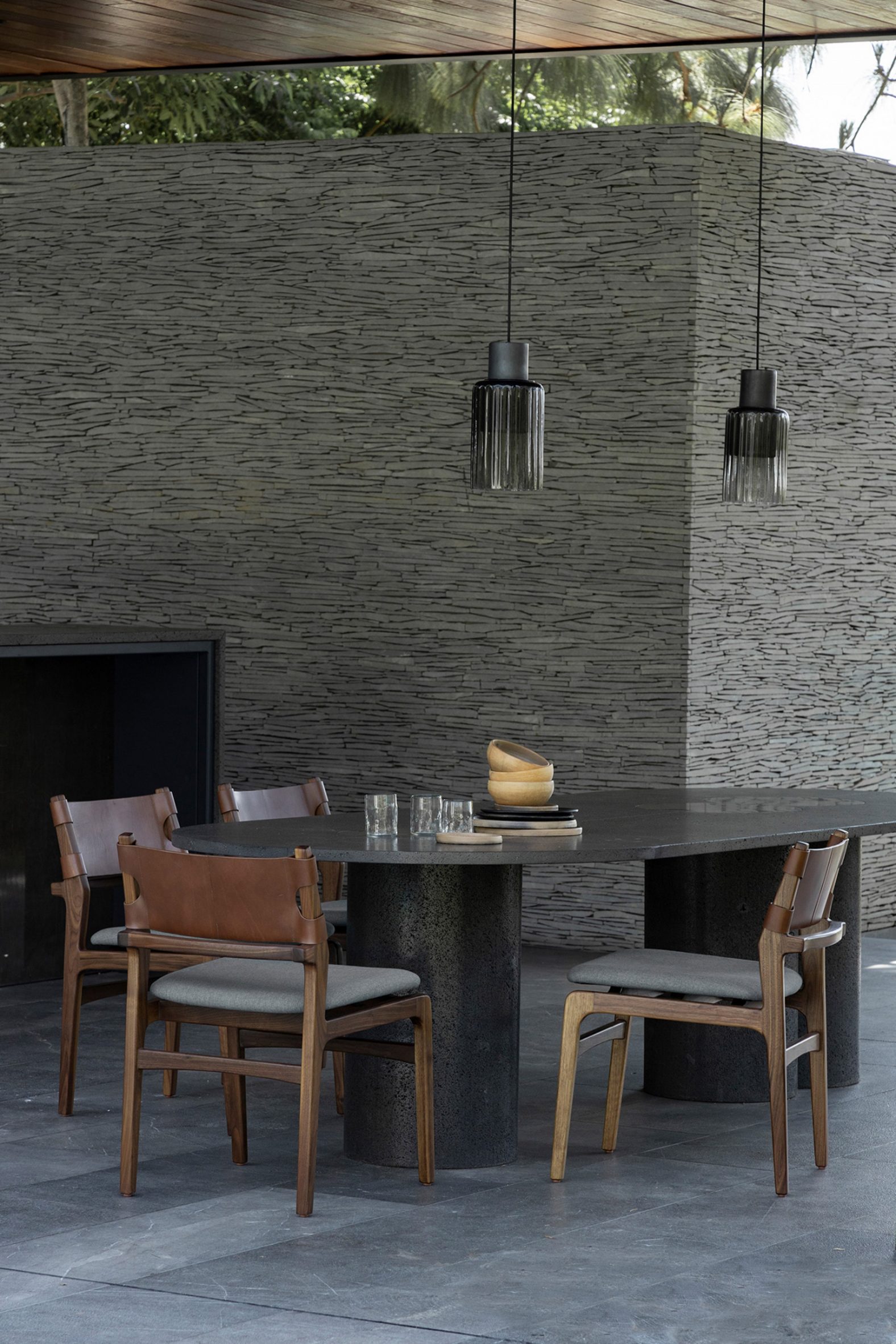 Barro pendant lamp over an outdoor dining table