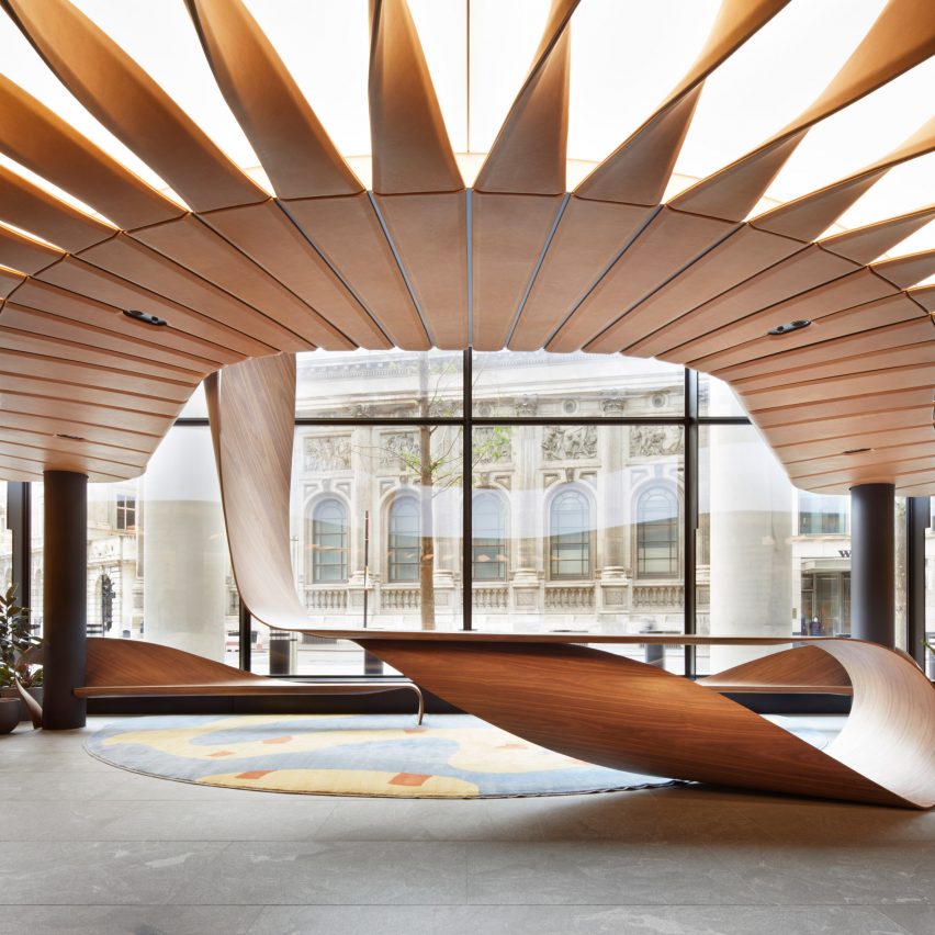 Leather ceiling installation above bent timber desk in 22 Bishopsgate lobby by Bill Amberg Studio