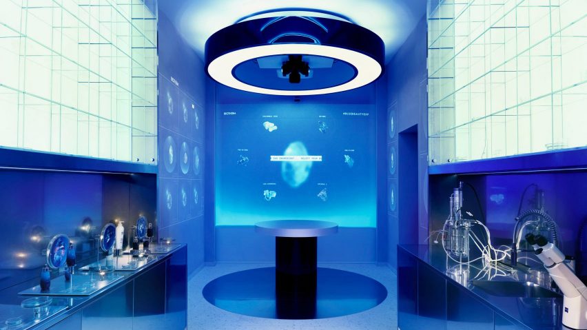 Biotherm concept store in Monaco has blue interiors with science lab-inspired details