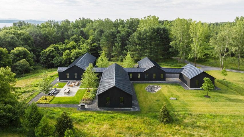 Birdseye references Vermont farmhouses with all-black cottage on Lake Champlain