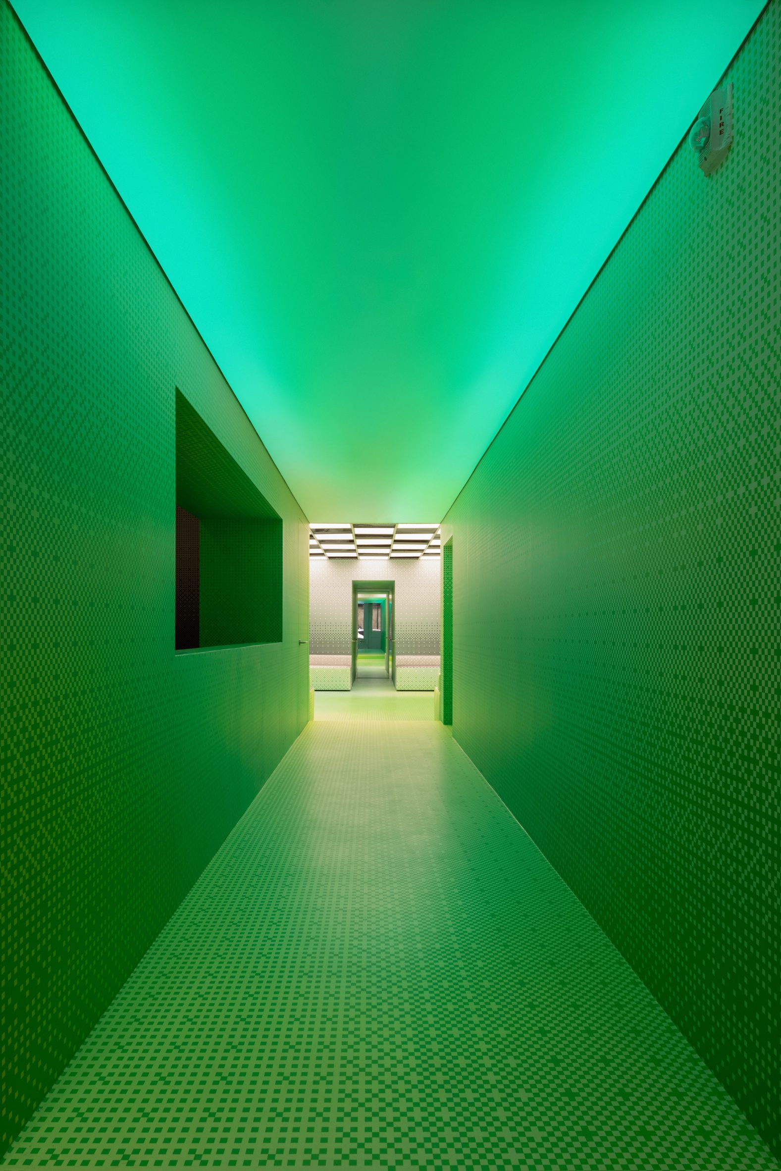 Green hallway with pixel print