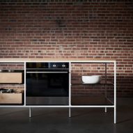 Photograph of kitchen island in dimly lit space