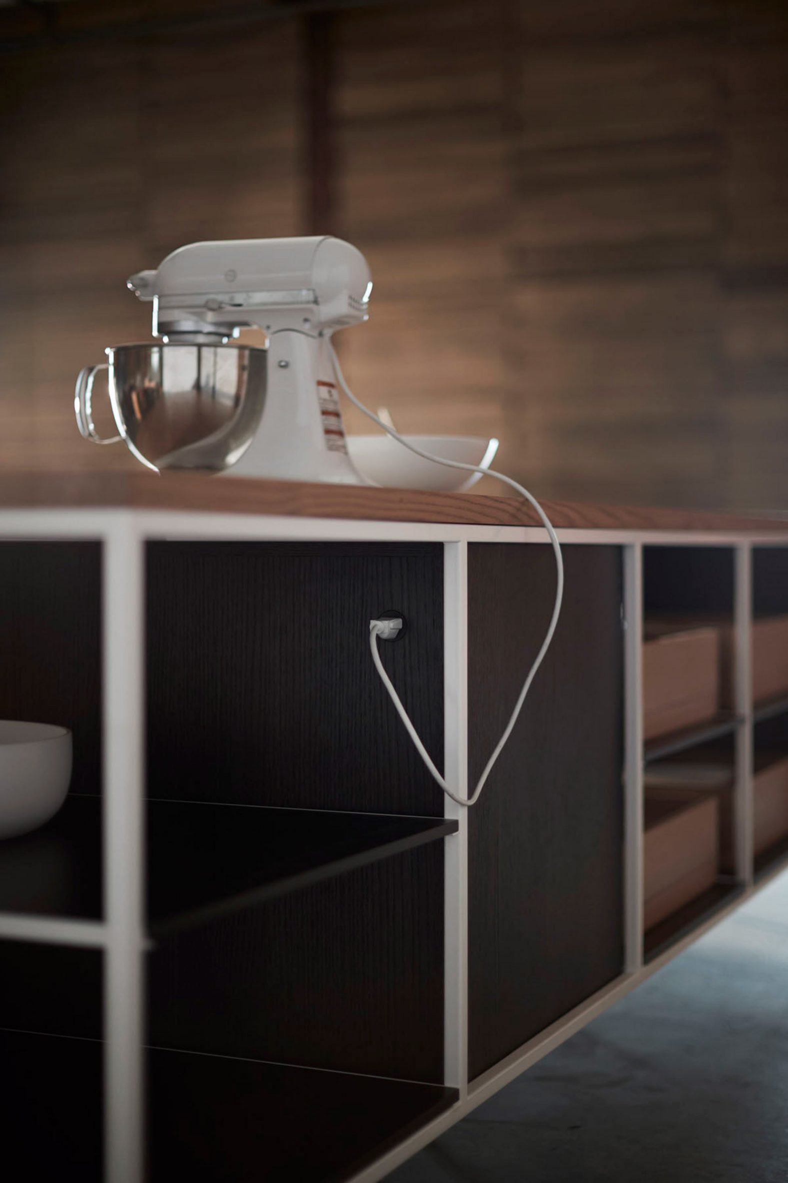 Detail of kitchen island with concealed outlets