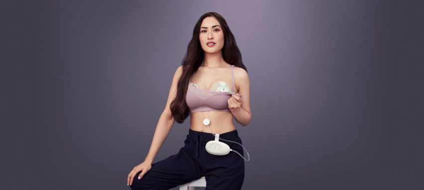 A woman wearing a bra and a breastpump