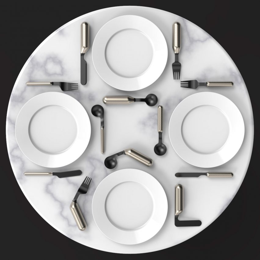 Overhead image of various Font cutlery sets arranged around circular plates on a circular table