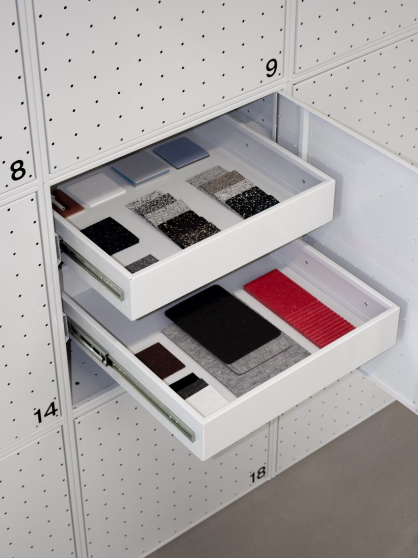 White drawers in a metal cupboard that contain material samples by Form Us With Love