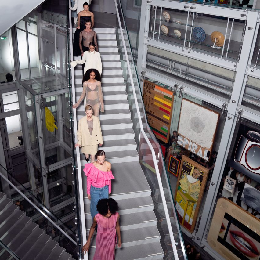 Models are pictured walking along the stairs at Depot Boijmans Van Beuningen
