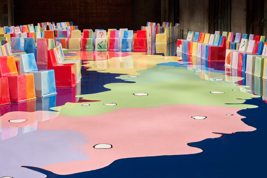 Image of chairs lined in rows at the Gaetano Pesce-designed Bottega Veneta show