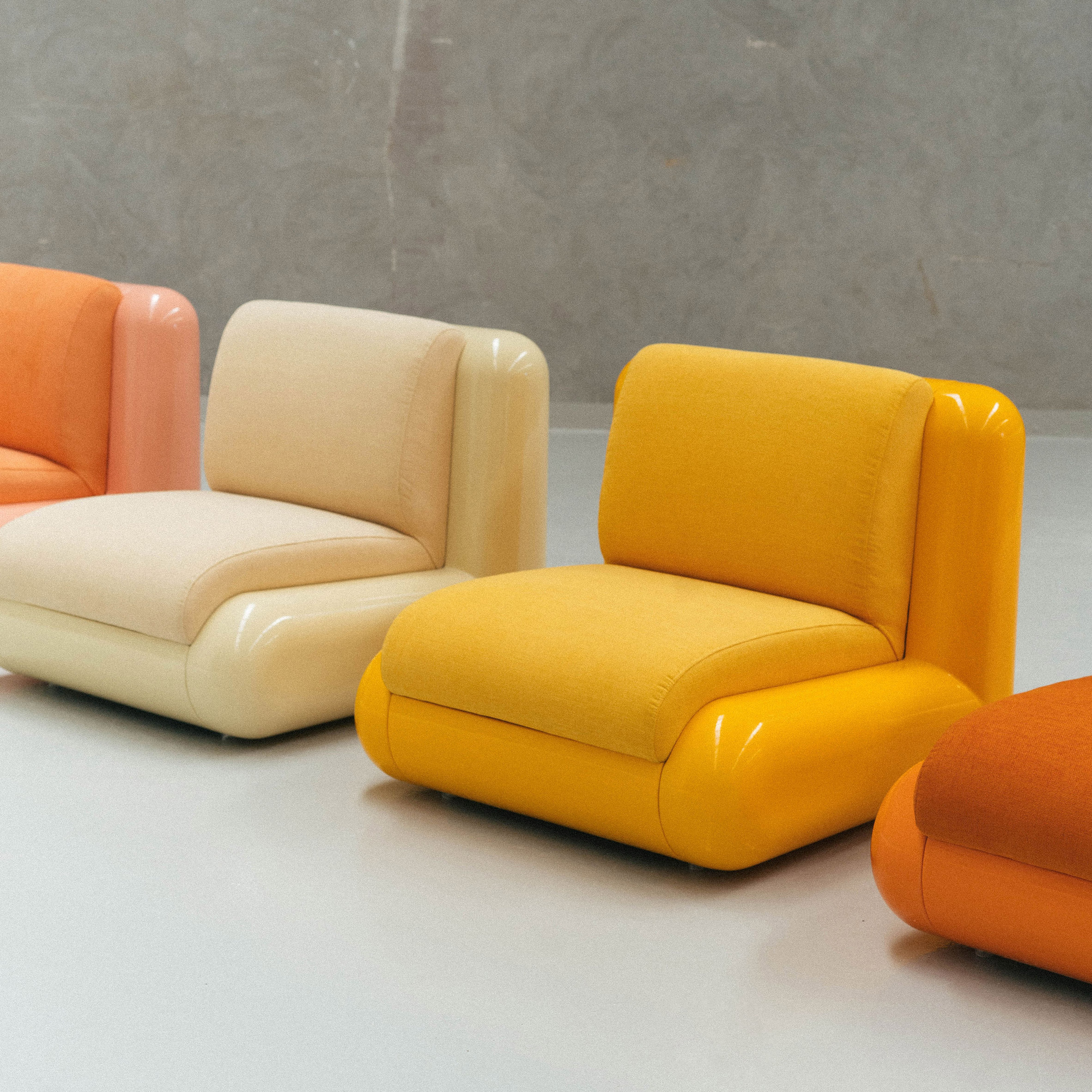 Orange and cream seats by Holloway Li