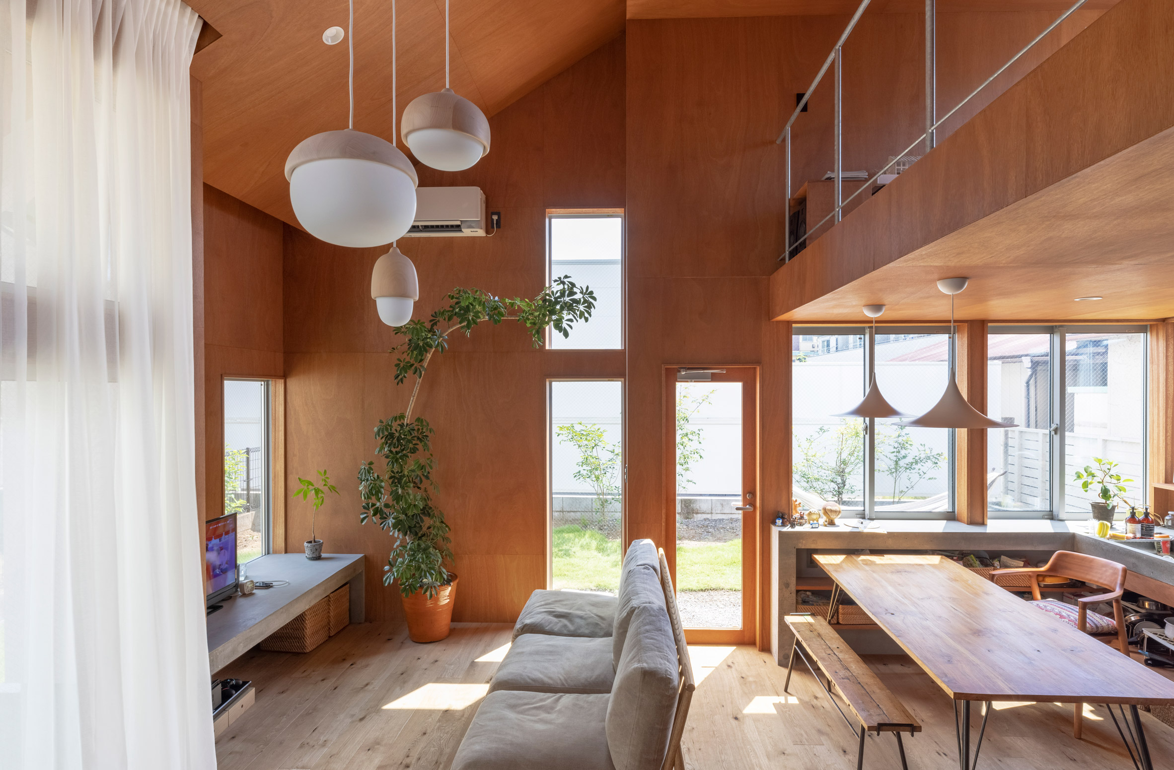 Wood-lined interior of a house in Akishima 