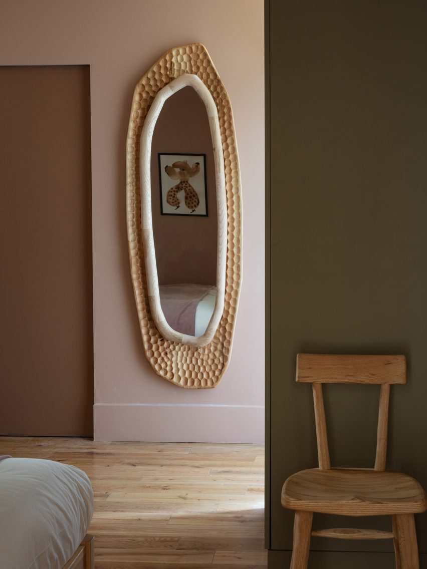 Curly mirror in the Town Hall Hotel suites hotel room by Jan Hendzel