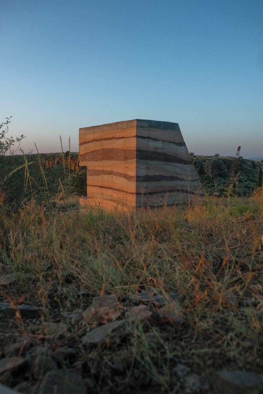 Rammed earth shelter at dawn in Arizona