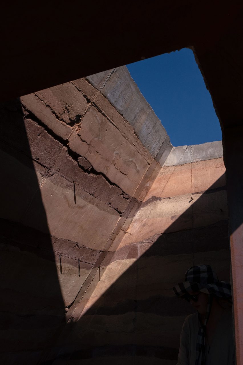 Oculus in roof of rammed earth shelter