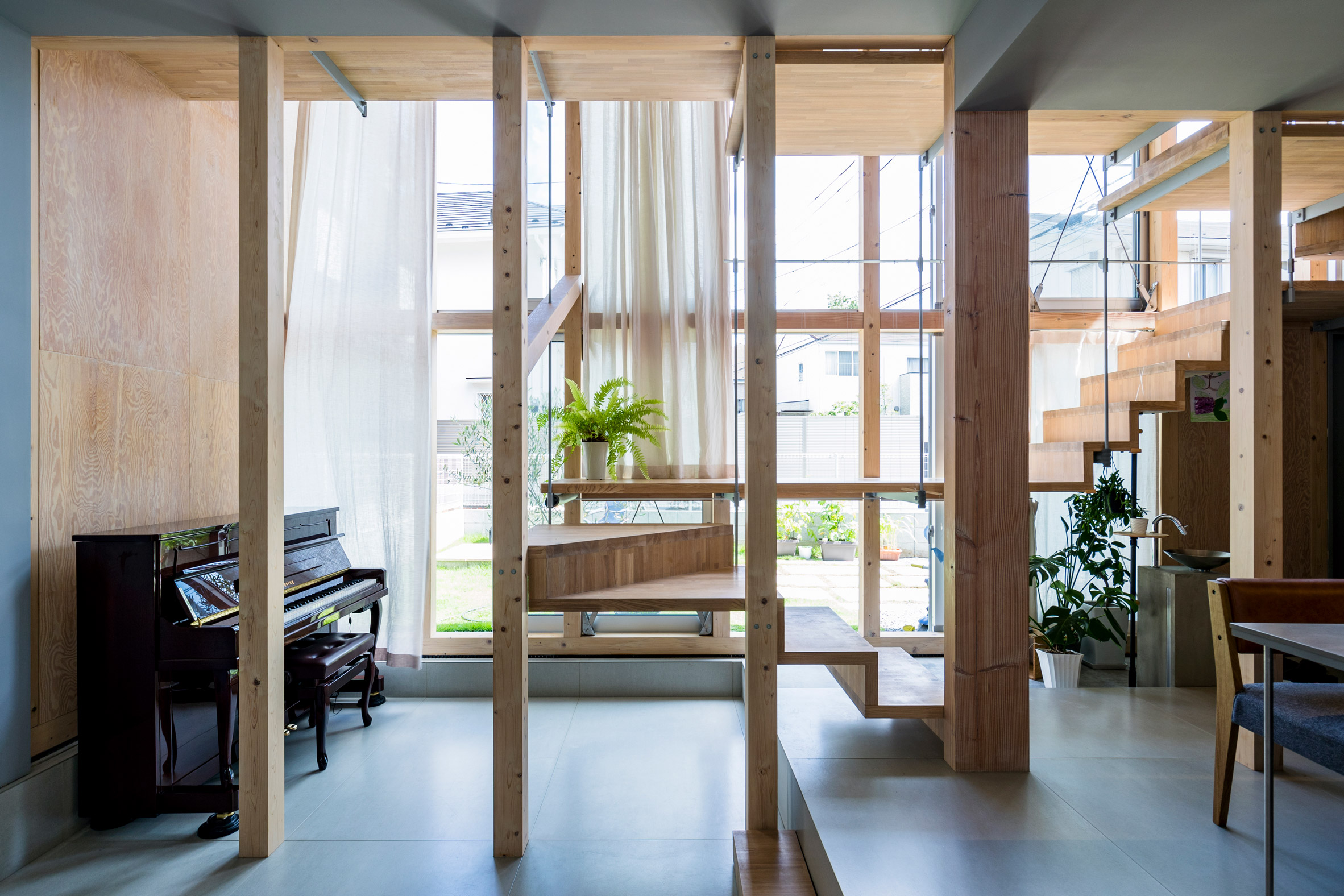 Timber structural columns, Light-Filled Stair Hall by Kiri Architects