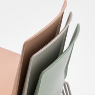 Detail of pastel coloured chairs stacked