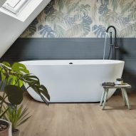 Photograph showing bath area with botanical print tiles