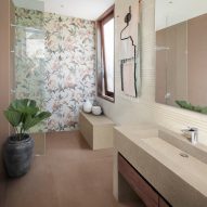 Photograph showing bathroom with botanical print tiles