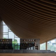 MUDA Architects completes bookstore in Chengdu with roof shaped like "a flipped book"