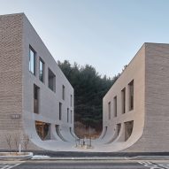 The two Cafe Teri buildings by Nameless Architecture with central courtyard